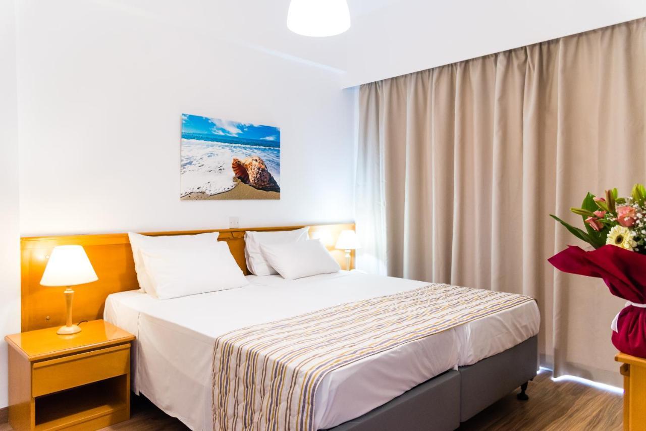 Helios Bay Hotel And Suites Klorakas Buitenkant foto
